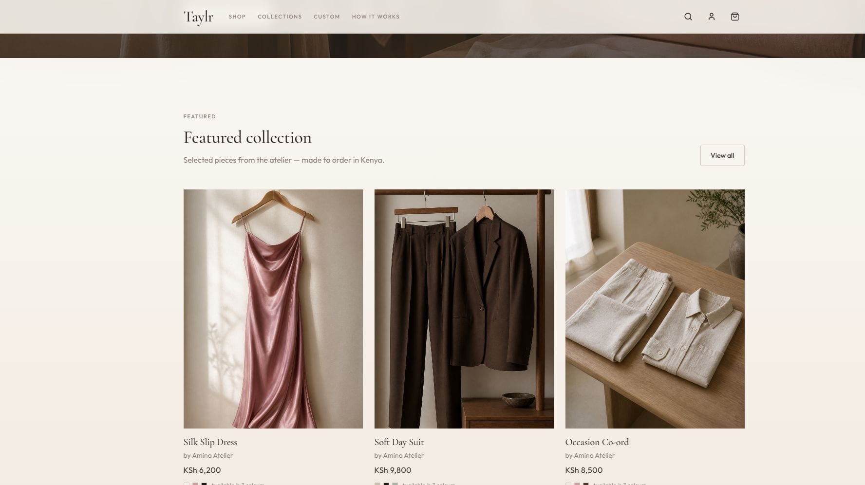 Taylr homepage featured collection grid of three Amina Atelier pieces — Silk Slip Dress, Soft Day Suit, and Occasion Co-ord — with Kenyan shilling prices and colour swatches.
